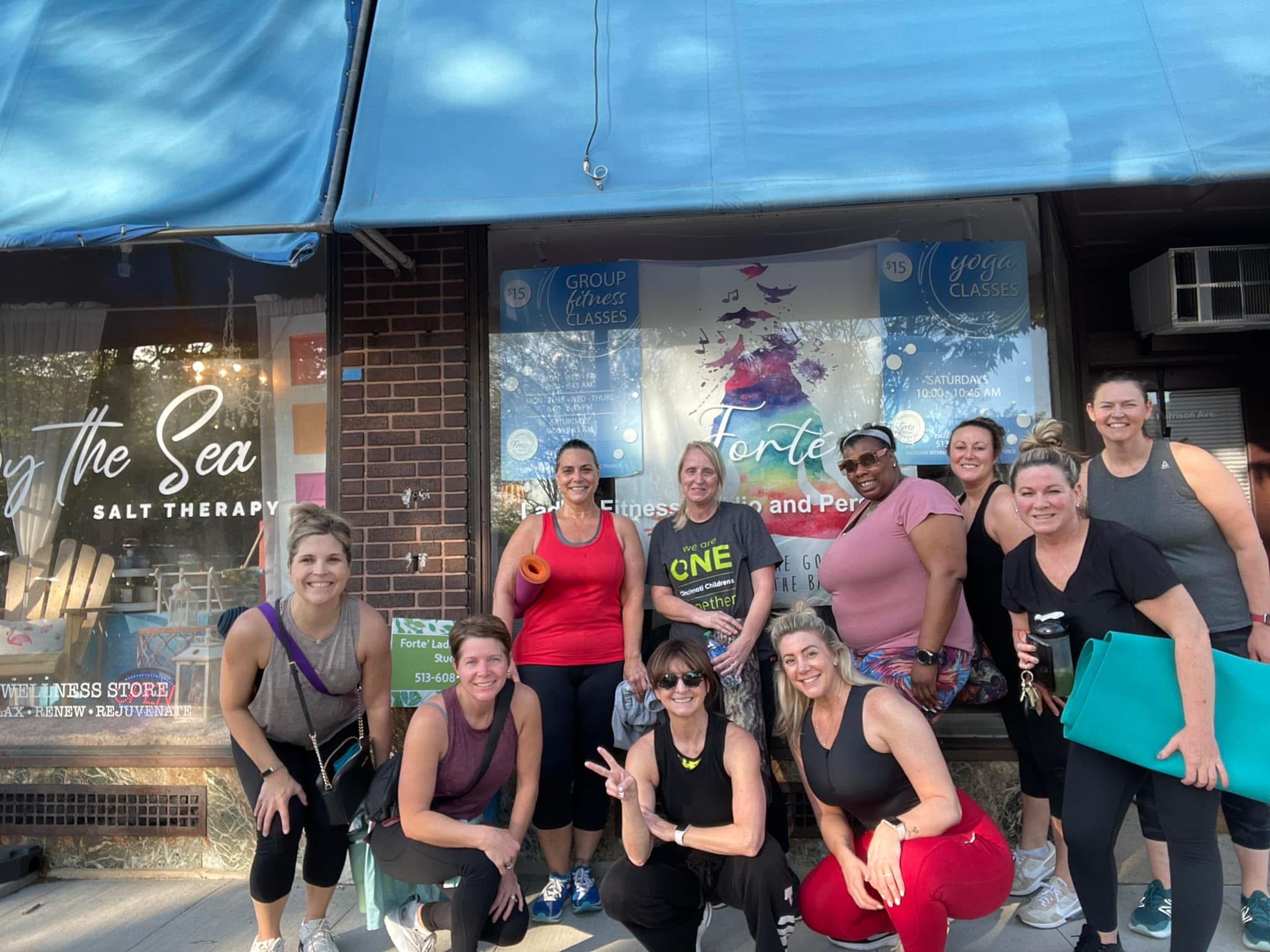 Group outside Forté storefront