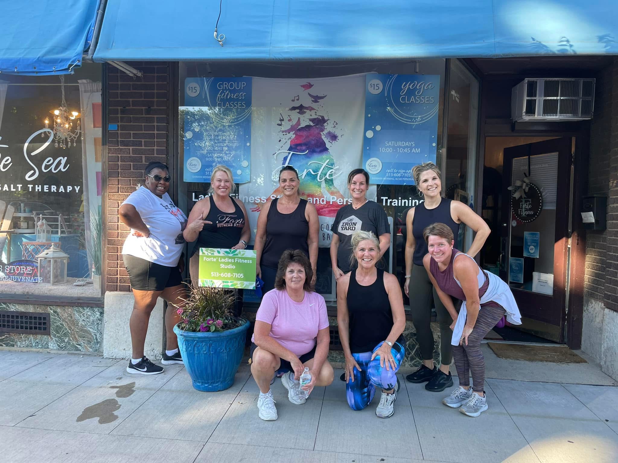 Group outside Forté storefront